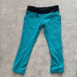 Nike womens Turquoise and Black Leggings